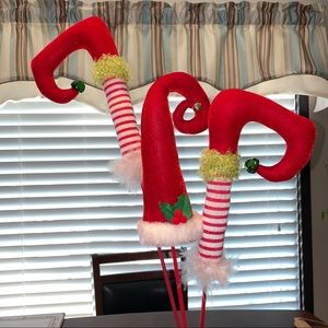 Kirkland’s Elf Leg Santa Hat Christmas Picks